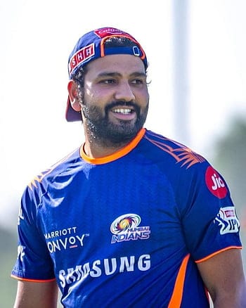 Why is Rohit Sharma not staying in the team hotel.
