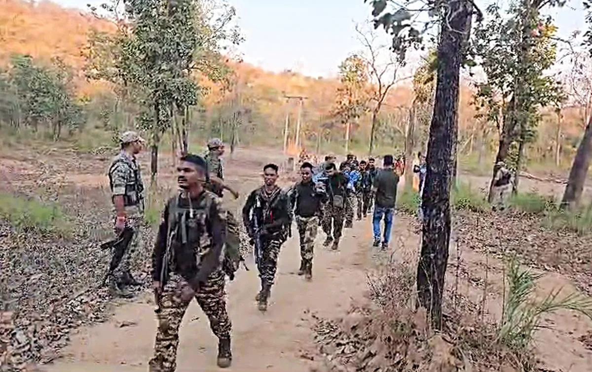 50 maoists surrendered in chhattisgarh before modi visit 