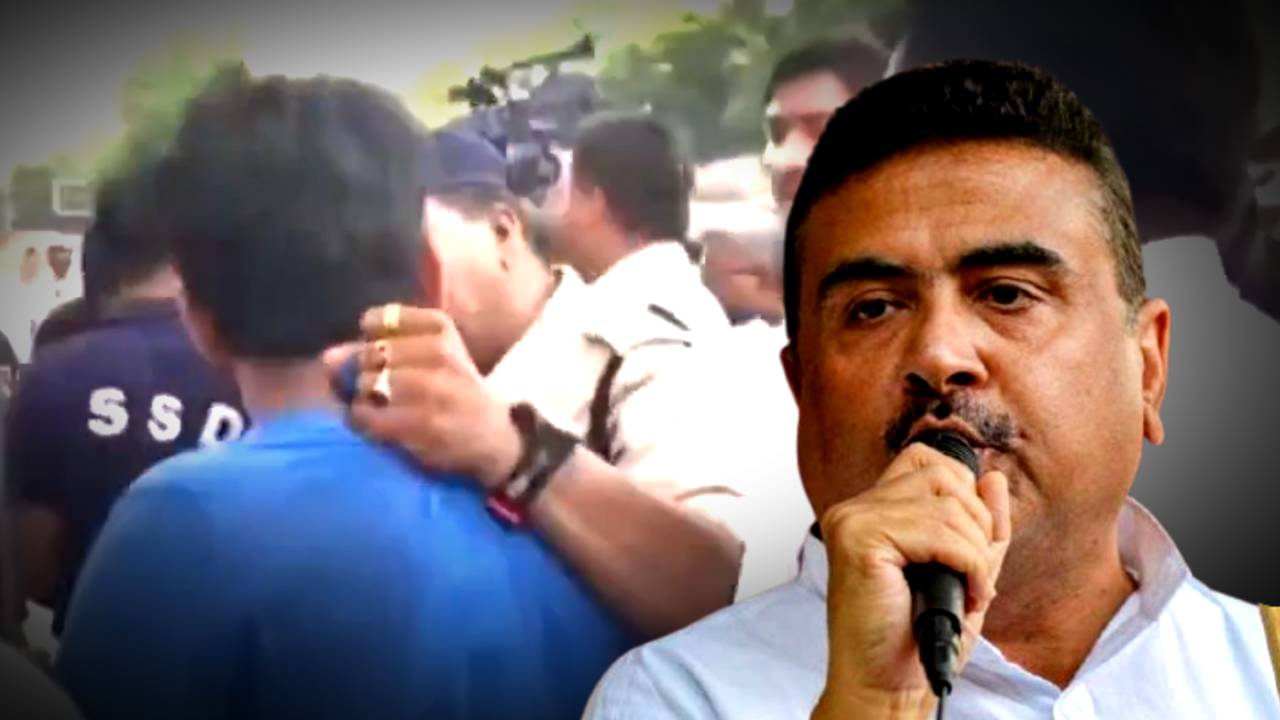 BJP MLA Suvendu Adhikari protests as Police held Journalist collar